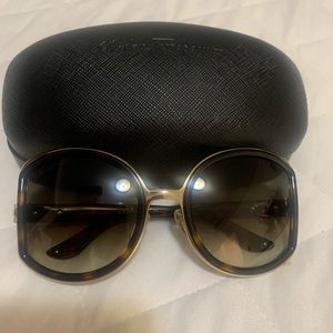 Salvatore Ferragamo sunglasses.